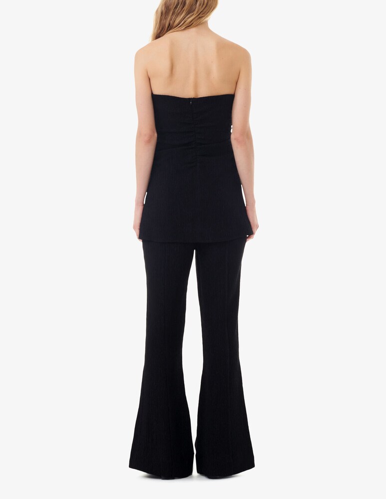 Ganni Pantaloni svasati in crêpe di viscosa stretch Saldi